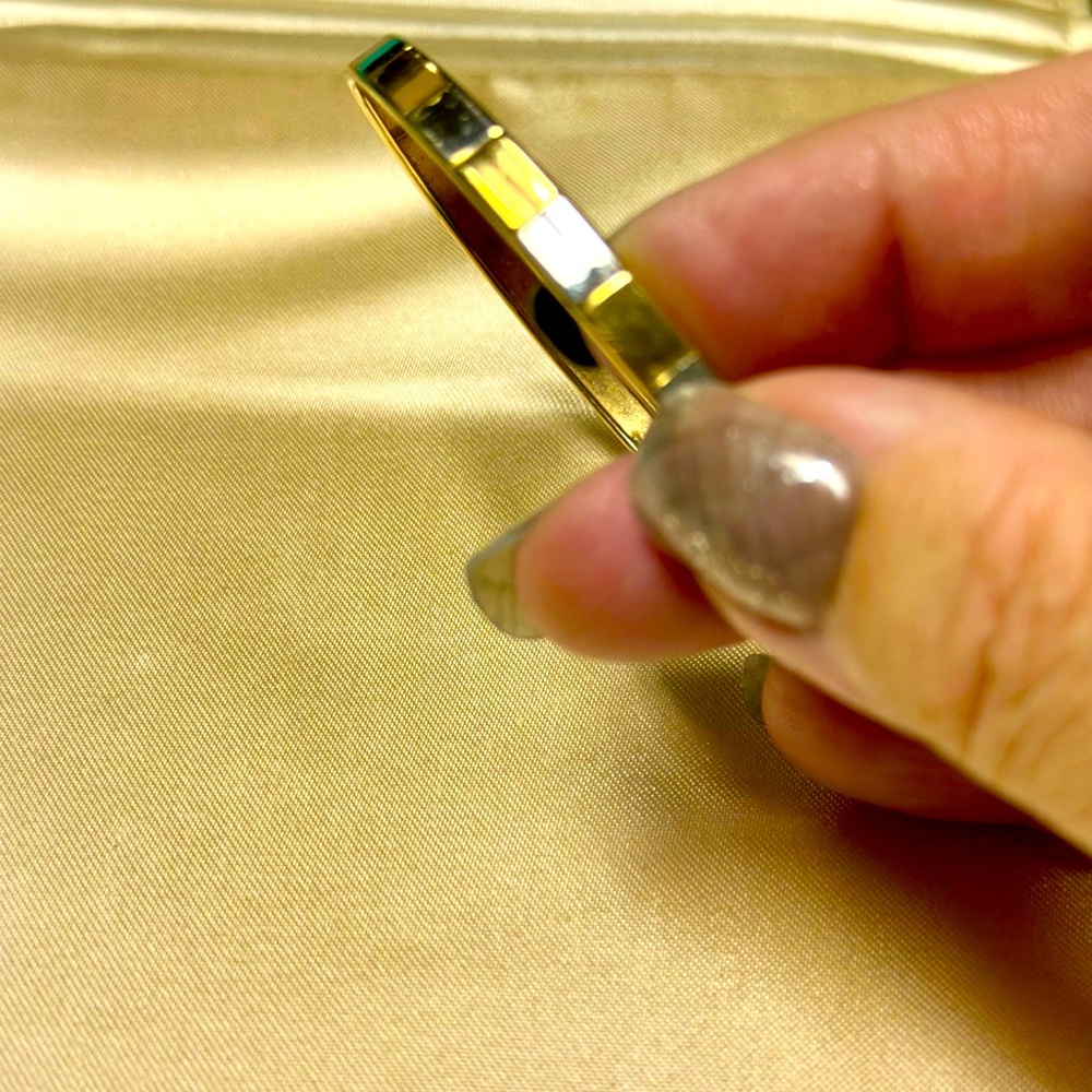 10 karat gold and sterling silver bangle bracelet